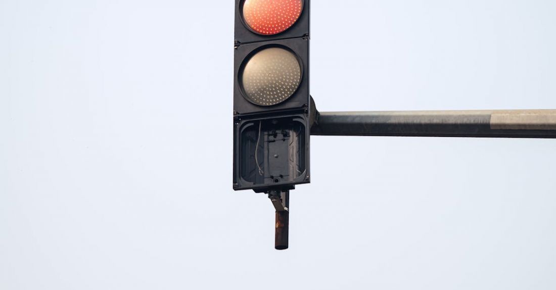 Traffic Management - Close-up of a Traffic Light Showing Red Light