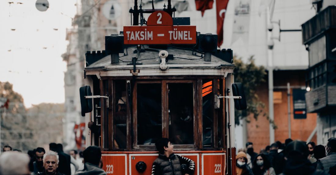 Urban Transport - A red trolley on a city street