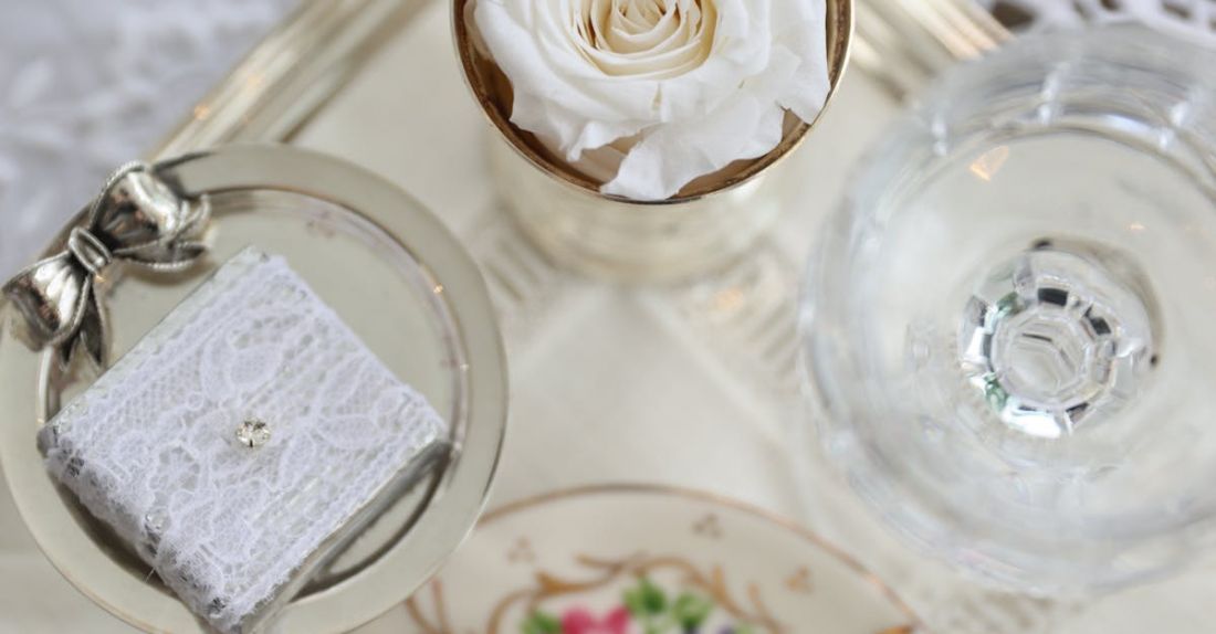 Water Fixtures - A tray with a cup of coffee and a flower